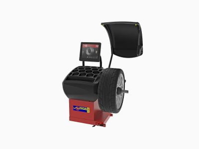 Däckbalanseringsmaskin med digital skärm i verkstad